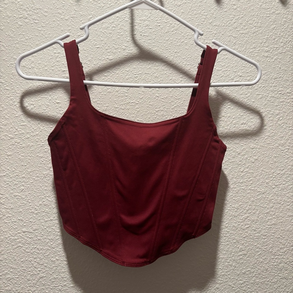 Scarlett colored cropped corset style top with zipper back and adjustable straps